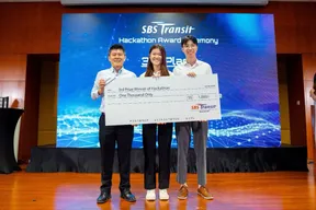 The SBS Spotless team receiving the third-place prize